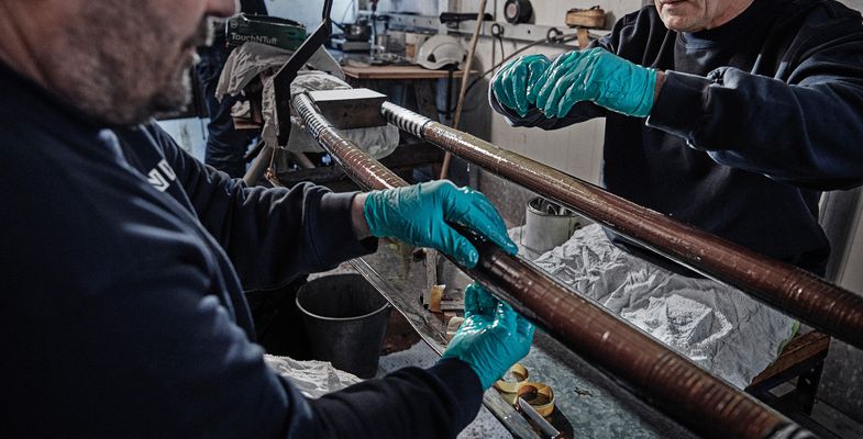 Cable workers repairing high-voltage cable